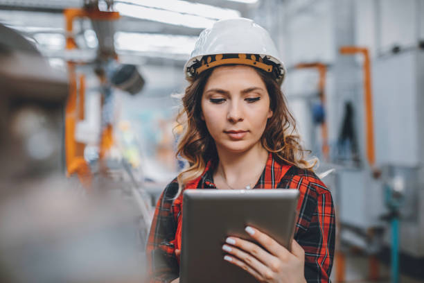 istock Young female maintenance engineer working with digital tablet 1272780175