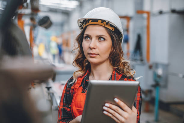 istock Young female maintenance engineer working with digital tablet 1272780176