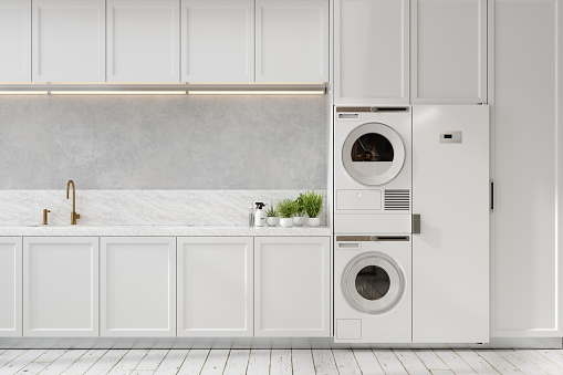 Luxury White Kitchen Interior with Laundry Room