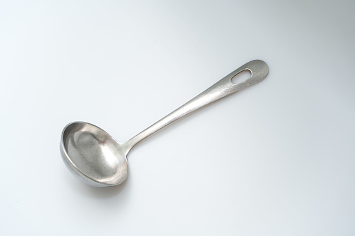 Old stainless steel ladle