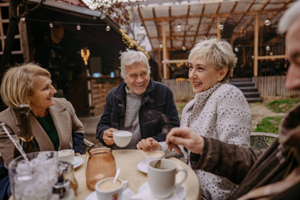 istock Senior friends getting together after Covid-19 lockdown 1272781835