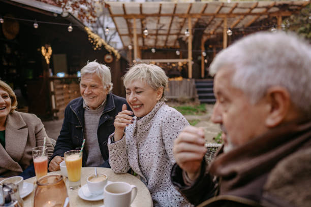 istock Senior friends getting together after Covid-19 lockdown 1272781921