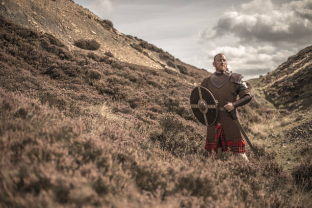 istock Scottish Redhead Warrior wearing a kilt 1272782697