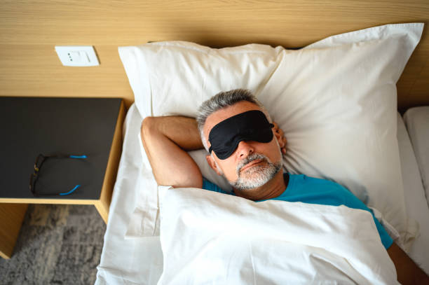 istock Mature man sleeping in bed 1272782726