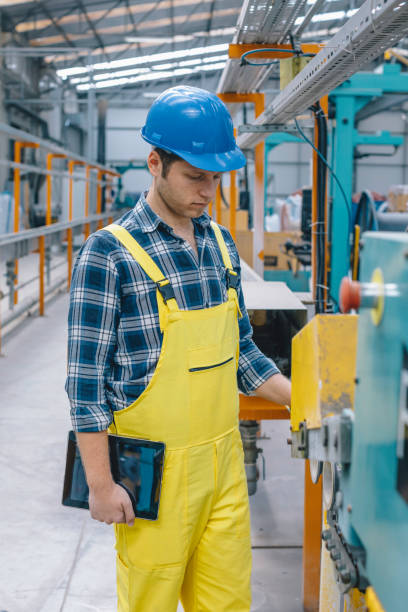 istock Young male maintenance engineer working with digital tablet 1272782741
