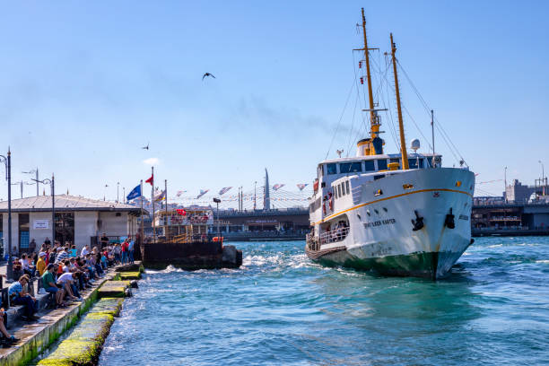 Istanbul, Turkey -Jun 12, 2018: People and ferry at Eminonu in Istanbul. Eminonu is one of the most famous place in Istanbul.