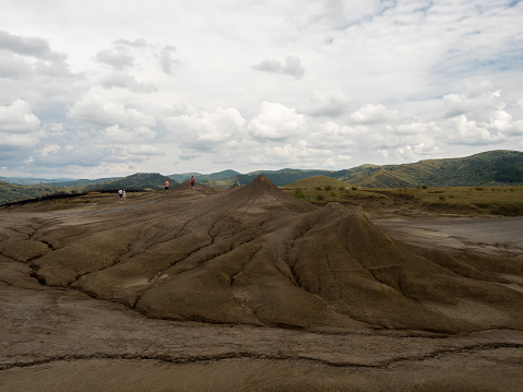 Berca/Romania - August 16 2020: The Berca Mud Volcanoes landscape. Those are small volcano-shaped structures caused by the eruption of mud and natural gases.