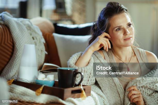 Enjoying Warm Tea In Cozy Sock On A Cold Autumn Day Stock Photo - Download  Image Now - iStock