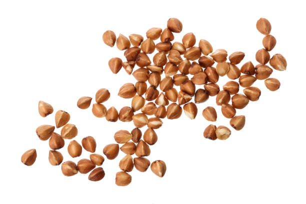 istock buckwheat grain isolated on white background . Top view. Flat lay. 1272785884