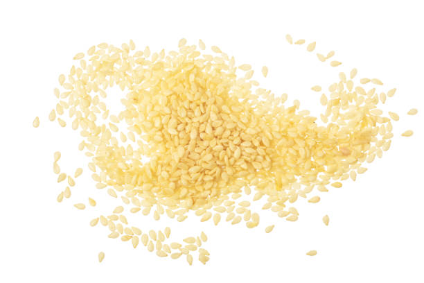 istock Sesame seeds isolated on white background top view. Flat lay 1272785895