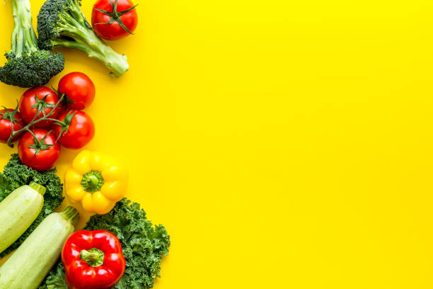 A tabletop arrangement of fresh vegetables multicolored, top view.
