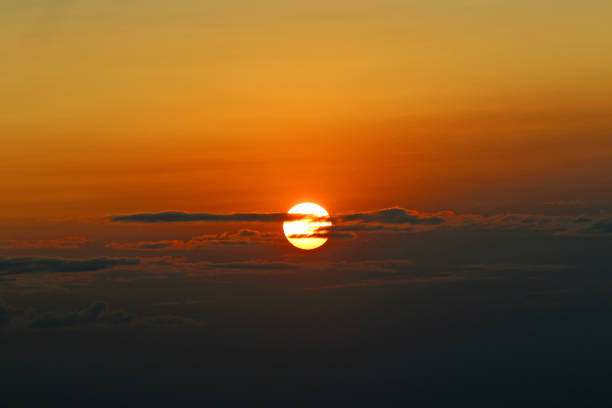 istock Vibrant sunset over a lake with deep rich tones 1272793180