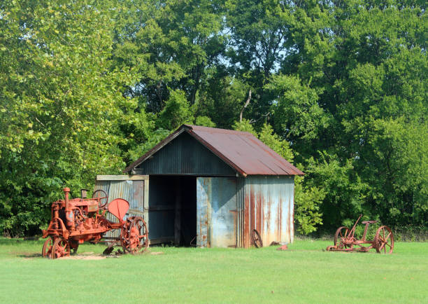 An old fashioned horse drawn cultivator sits in the barn in Cades Cove in the Great Smokey Mountains National Park.