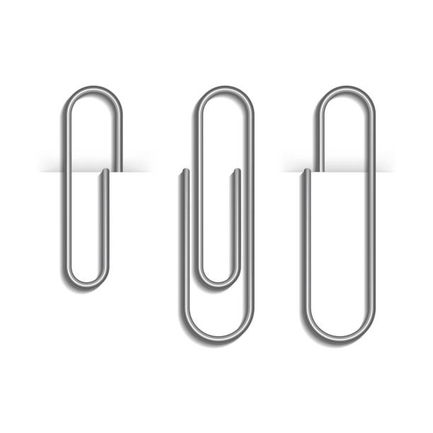 istock Metal paper clips isolated on white background. Metal paper clips attached to paper. Vector illustration. 1272795752