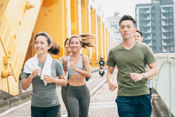 istock Friends jogging in the city 1272798529