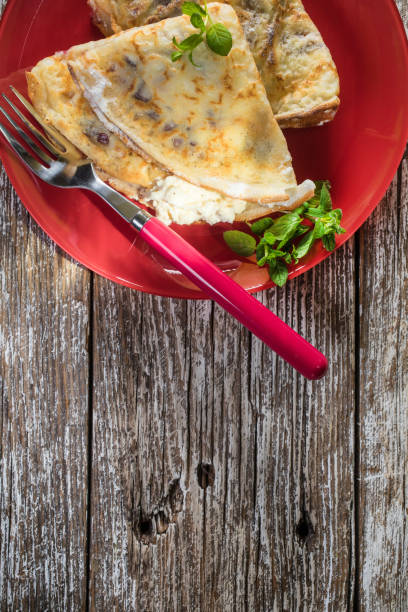 istock Crepes with ricotta cheese and blackcurrant jam. 1272798563