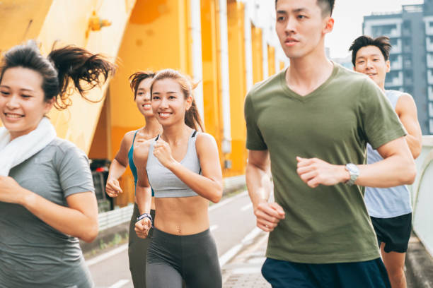 istock Friends jogging in the city 1272798645