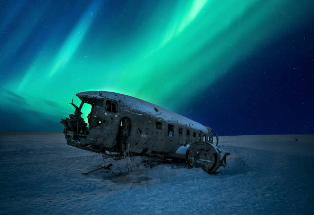 istock Plane crashed in Iceland with northern lights dancing on the background on a snowscape 1272798675