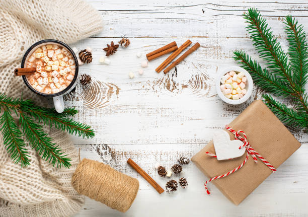 istock Zero waste Christmas concept. Hand crafted christmas gift wrapping without plastic, hot Chocolate drink and Marshmallows. 1272799665