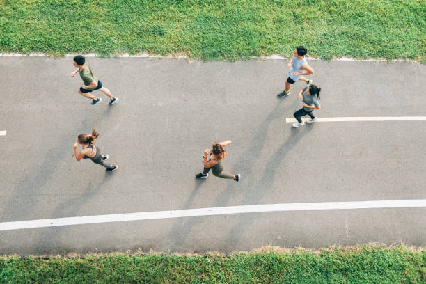 istock Friends jogging in the city 1272799688
