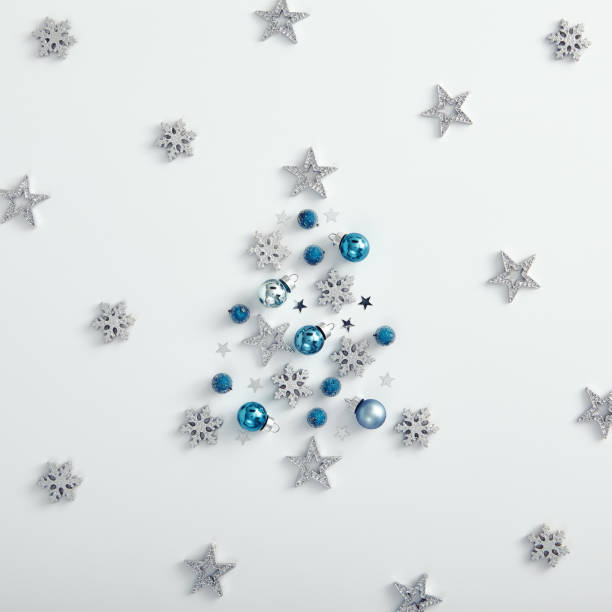 istock Silhouette of christmas tree from xmas decoration with silver star 1272800966