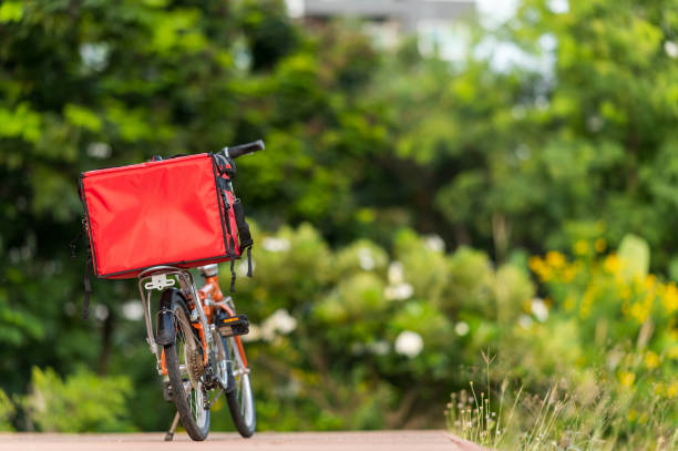 istock A red bag placed on a bicycle preparing to deliver parcels to customers 1272801934