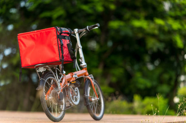 istock A red bag placed on a bicycle preparing to deliver parcels to customers 1272801941