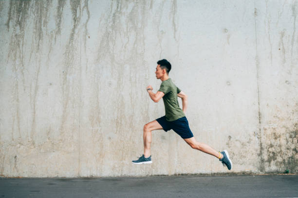 istock Man jogging in the park 1272802323