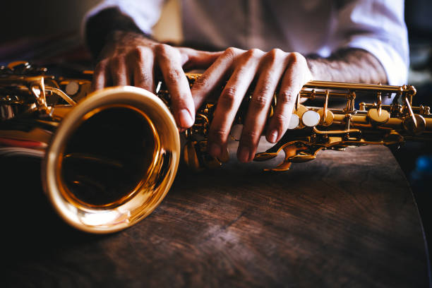istock The hands of the saxophone player 1272806407