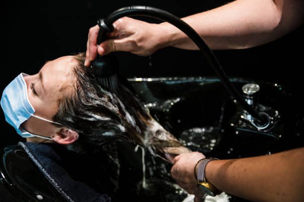 istock Hair washing at the salon 1272806909