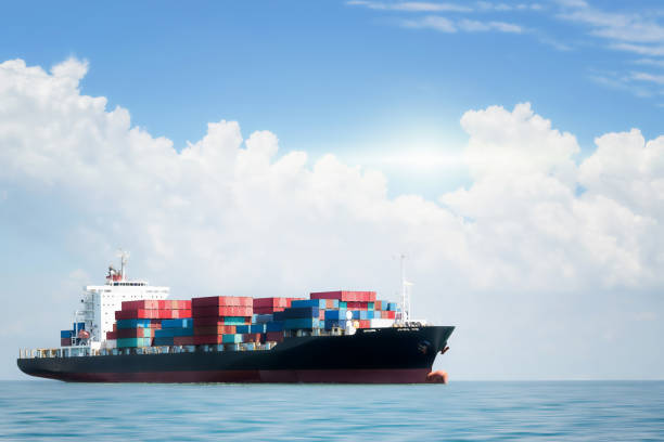 istock Container cargo ship in the ocean at blue sky, Global business logistics import export background, Freight transportation, Shipping 1272807185