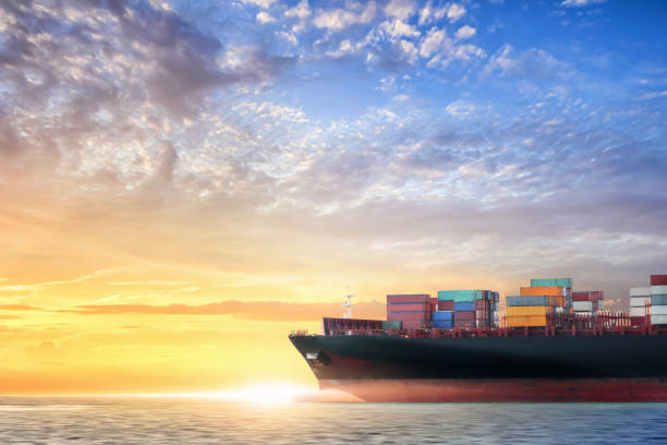 istock Container cargo ship in the ocean at sunset sky, Global business logistics import export background, Freight transportation, Shipping 1272807199