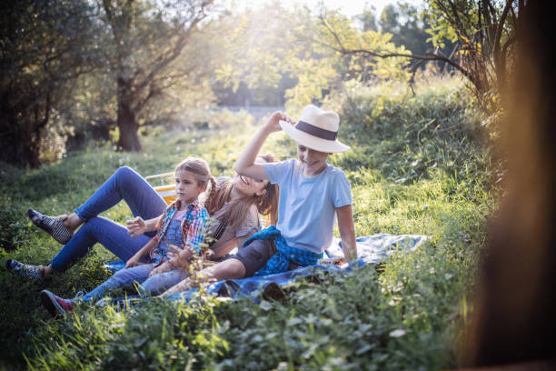 istock Parent and two children on camping trip 1272810565