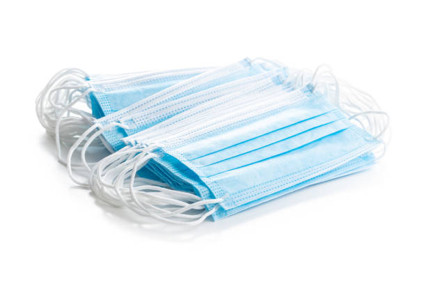 istock Blue paper face masks. Corona virus protection. 1272810935