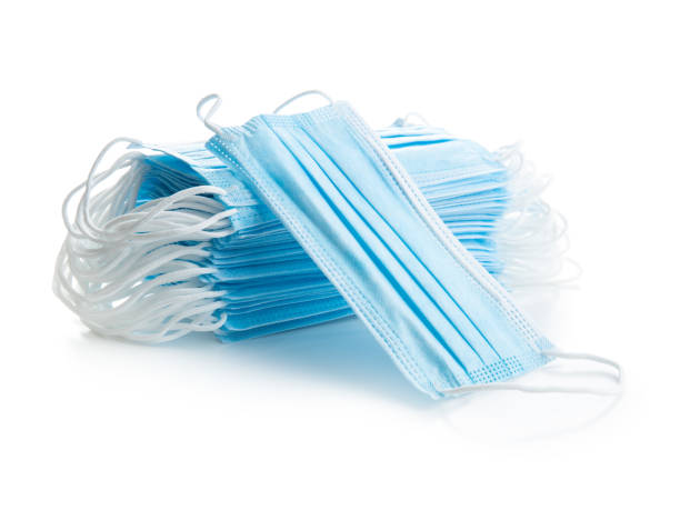 istock Blue paper face masks. Corona virus protection. 1272811039