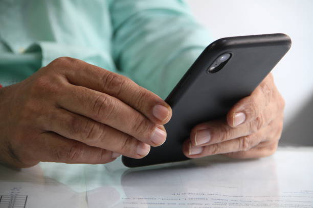 istock Mobile phone in hands working has become need to growing 1272812113