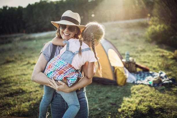 istock Parent and two children on camping trip 1272812632