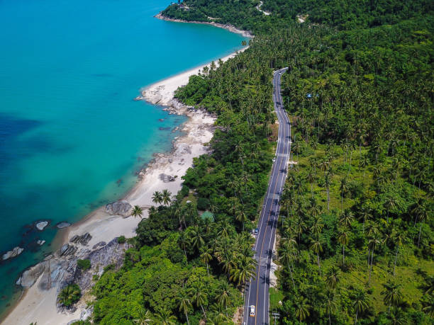 istock aerial view of beach road at Khanom district 1272814261