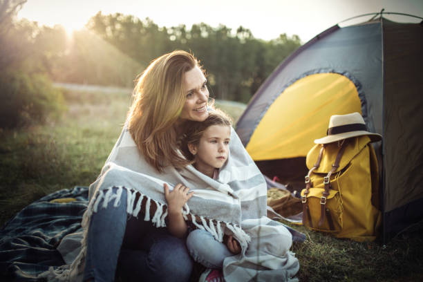 istock Family on summer  vacation camping in forest 1272814287