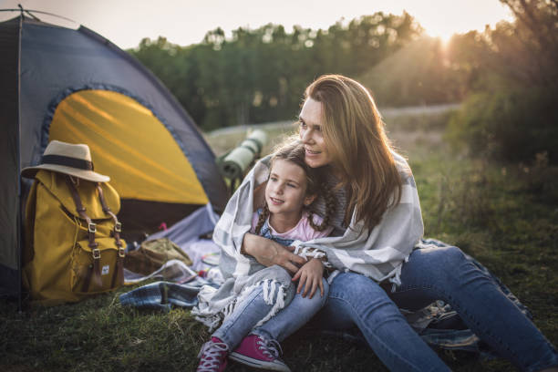 istock Family on summer  vacation camping in forest 1272814293