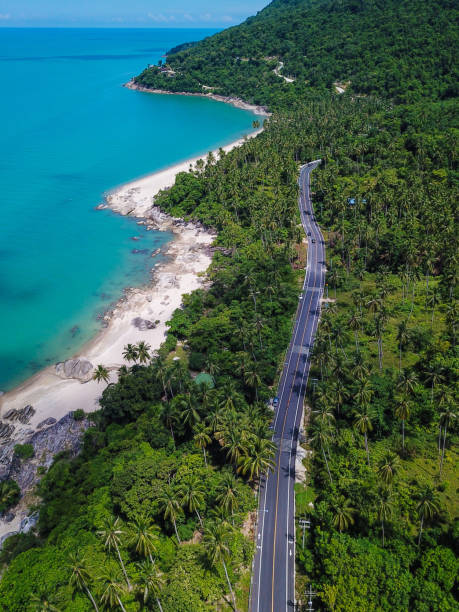 istock aerial view of beach road at Khanom district 1272814295