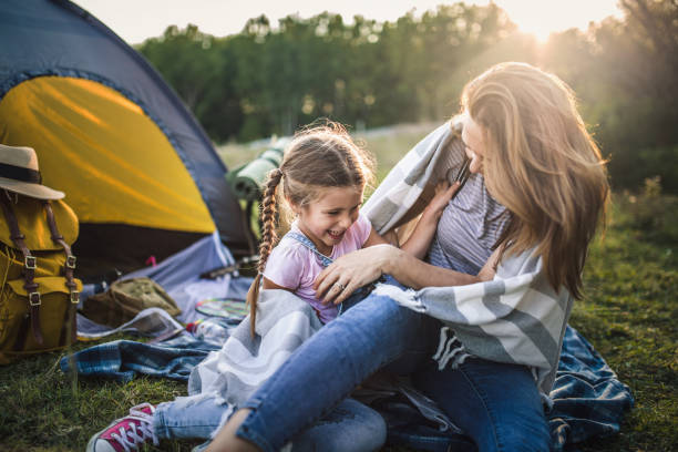 istock Family on summer  vacation camping in forest 1272815220