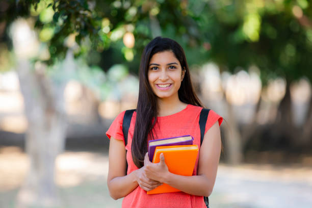 Young Indian Female University Student stock photo Student, University Student, Women, Adult, Females south asia stock pictures, royalty-free photos & images