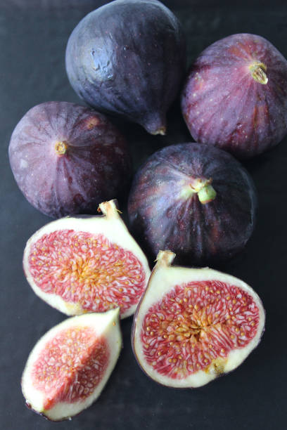 istock Purple figs on a dark background 1272817078