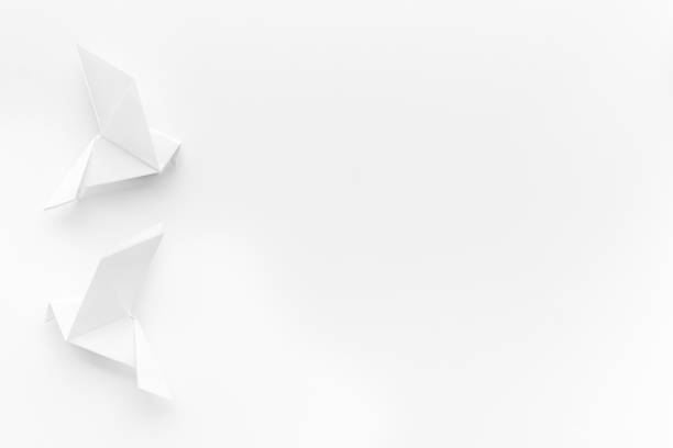 istock Origami concept. Paper birds top view, copy space 1272818741