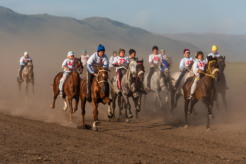 Kazakhstan, Shalkode, July 21, 2018.\nSeries Traditional horse racing at a rural festival. Baiga is one of the oldest and most popular types of horse racing among many Turkic peoples. Distances range from 5 to 50 kilometers. Riders are usually boys 10-15 years old. As a reward, the owner of the winning horse receives cars or cash prizes.