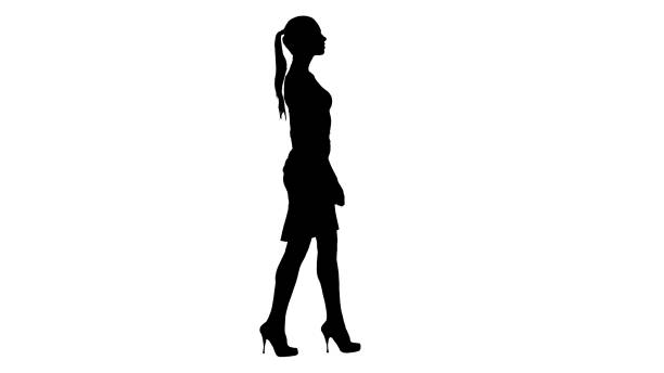 istock Silhouette Young business woman is walking 1272820389