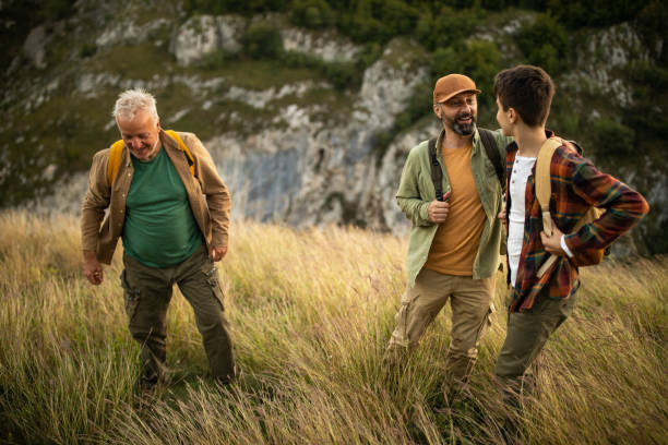istock Three-generation family hiking together on mountain 1272820838