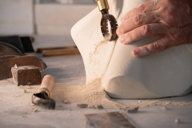 istock Carving the clay with pottery tools 1272820995