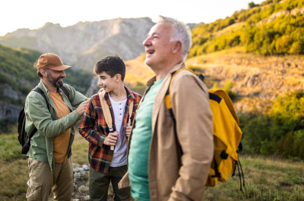 istock Three-generation family hiking together on mountain 1272821248